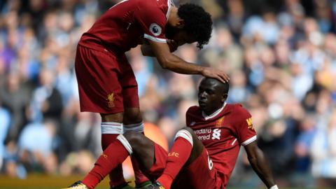 Mo Salah consoles Sadio Mane following his red card