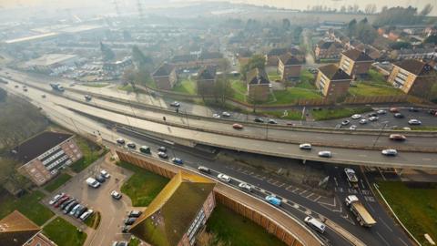 Redbridge flyover aerial image shows a large dual carriageway snaking above a large roundabout.
