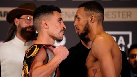 Jordan Gill faces off with Zelfa Barrett at the weigh-in