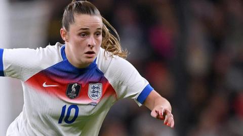 Ella Toone in action for England