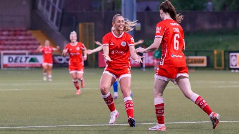 Teegan Lynch celebrates scoring the equaliser