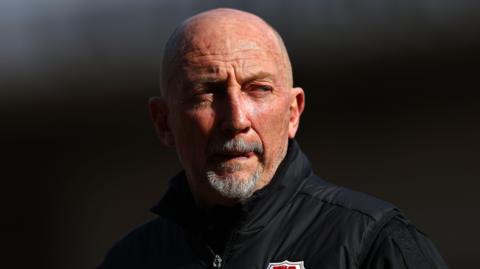 Ian Holloway looking to the left during a training session