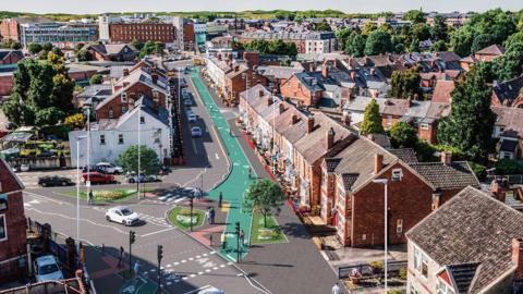 A computer-generated image of what a cycle spine looks like down a residential street leading out of a city centre, lined with Edwardian houses. A shopping centre can be seen in the background.