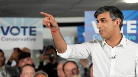 Britain's Prime Minister Rishi Sunak speaks at a Tory party rally at the Amersham and Chiltern Rugby club in Amersham, Britain, May 27, 2024.
