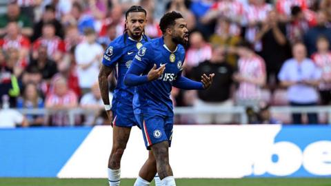Reece James and Malo Gusto look annoyed