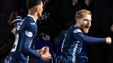 Ross County's Josh Sims celebrates after scoring to make it 1-0