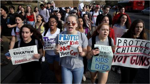 Students walk out