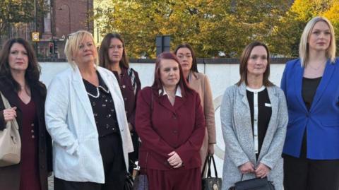 Nurses from Darlington Memorial Hospital arrive at the Civil and Family Courts and Tribunals Centre in Newcastle