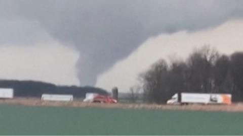 A large tornado (or funnel cloud}