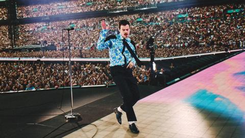 Harry Styles performing his Together, Together tour at Wembley Stadium, north London, the final show of his 12 London tour dates.