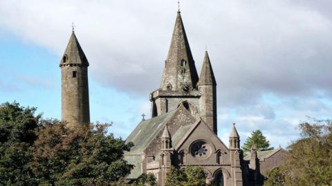The exterior of Brechin Cathedral with a tower to the left 