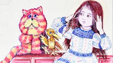 A brightly coloured Peter Firmin illustration showing Bagpuss sitting on a pink cabinet beside Emily, who is wearing a long patterned dress with blue trim. Professor Yaffle perches between them. Bagpuss is painted in pink and orange stripes against a pale background.