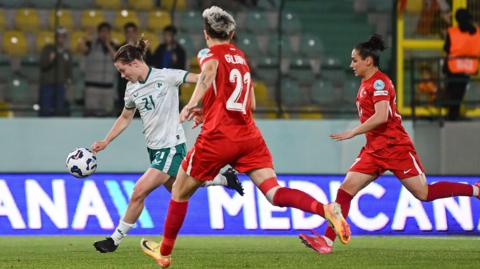 Emily Murphy scores a goal against Turkey