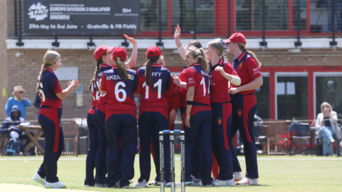 Jersey women's cricket team celebrate during a match against Germany