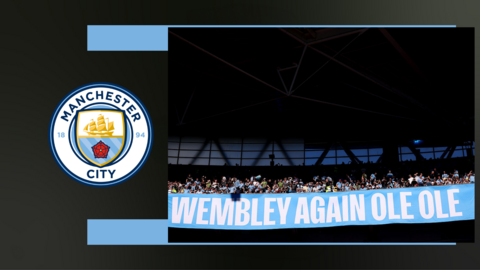 A sign within fans reads 'Wembley again ole ole'