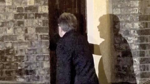 Mandelson arrives home