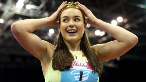 Isabelle Boffey puts on a crown