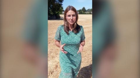 Correspondent Helena Wilkinson outside in dry field