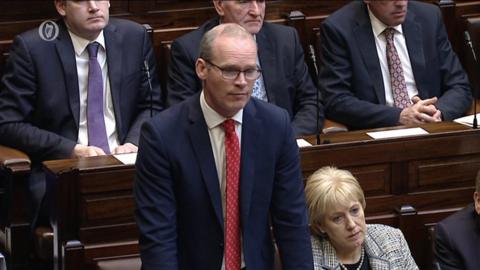 The Tánaiste was making the comments after the secretary of state issued an apology.