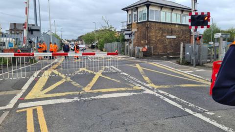 Missing level crossing barrier on line between Gillingham and Rainham