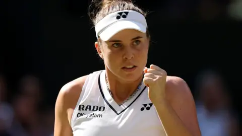 Karolina Muchova hits a forehand