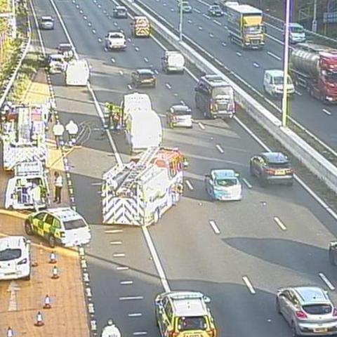 Traffic camera pictures showing a number of damaged vehicles on the hard shoulder of the M4 near Bristol, with emergency service vehicles on the scene. 