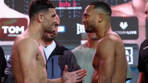 Jack Catterall smiles and holds out his hand to Harlem Eubank during a face-off