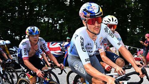 Tom Pidcock competes on stage 13 of the Tour de France