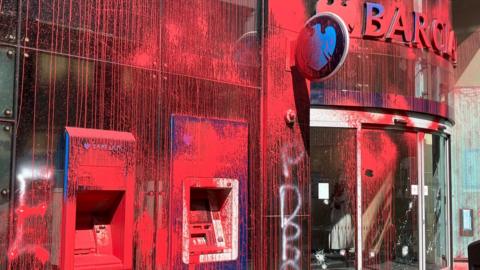 Barclays Bank in Leeds covered in red paint