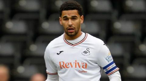 Ben Cabango looks on during a Swansea City game