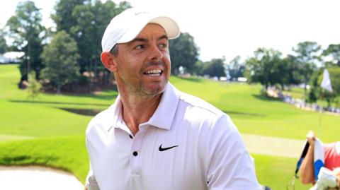 Rory McIlroy walks off the 18th green following the final round of the Tour Championship