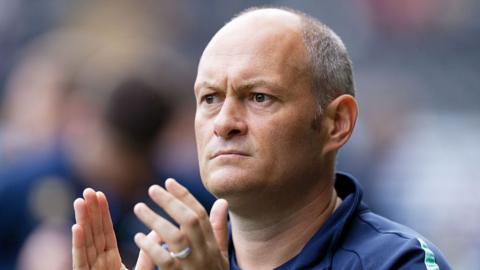 Millwall boss Alex Neil claps his hands