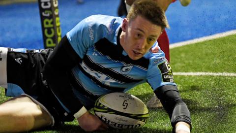 Josh Adams scoring a try for Cardiff