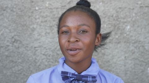 School pupil looking at the camera