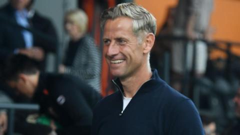 David Hughes looks on from the touchline during a game
