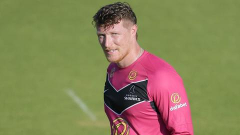 Tom Alsop walks off after batting for Sussex Sharks