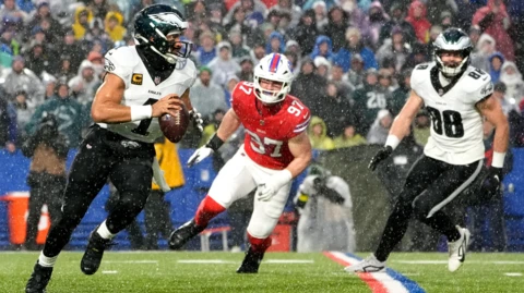 Jalen Hurts runs the ball for the Philadelphia Eagles against the Buffalo Bills