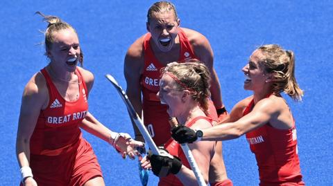 Great Britain captain Hollie Pearne-Webb celebrates bronze at the Tokyo Games in 2020