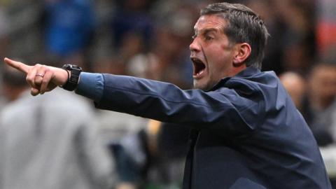 Cristian Chivu points and shouts