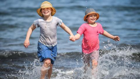 Two children in the sea