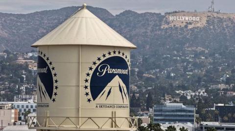 In an aerial view, the Paramount logo is displayed on a water tower at the Paramount Studios lot on July 13, 2026 in Los Angeles, California.