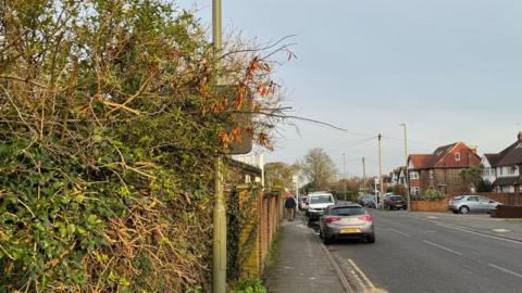 Vehicle-activated speeding signs in Cottimore Lane, Walton-on-Thames