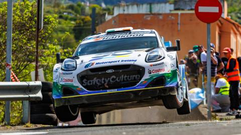 Jon Armstrong drives in the WRC
