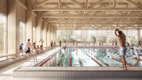 A CGI image of how the leisure centre would look. It shows a swimming pool, with swimmers.  A man is preparing to dive.