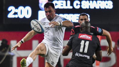 Luke Morgan of the Ospreys kicks ahead