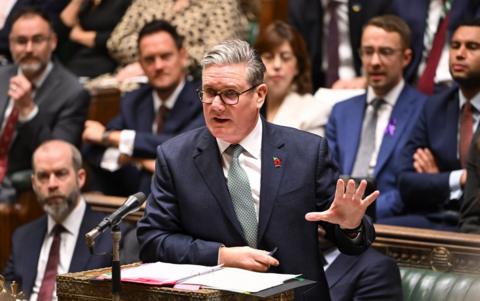 Keir Starmer gestures with his left hand at the despatch box in the Commons