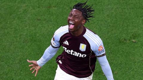 Jamaldeen Jimoh-Aloba is celebrating scoring for Aston Villa in the Europa League