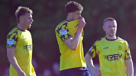Dejected Torquay players