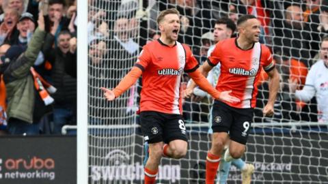 Luke Berry is celebrating after scoring a goal to make it 1-1 during the Premier League match between Luton Town and Nottingham Forest at Kenilworth Road