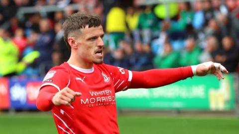 Crewe's Josh March celebrates his late winner against Notts County